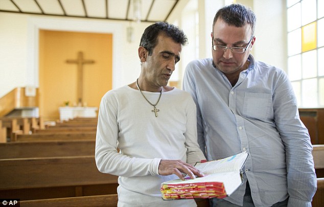 Hundreds of Iranian and Afghan refugees seeking asylum in Germany have converted from Islam to Christianity at an evangelical church in Berlin, a church leader has revealed.
