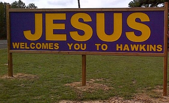 After leaders of a small Texas town were faced with a lawsuit from Freedom From Religion Foundation over a religious-themed greeting sign to the city of Hawkins, other communities rallied to support the concept that Jesus is welcome in East Texas. Now city officials are on the path to sue church representatives who believe they took over the property on which the sign was erected. Which entity that holds a clear title to the property is still in question.