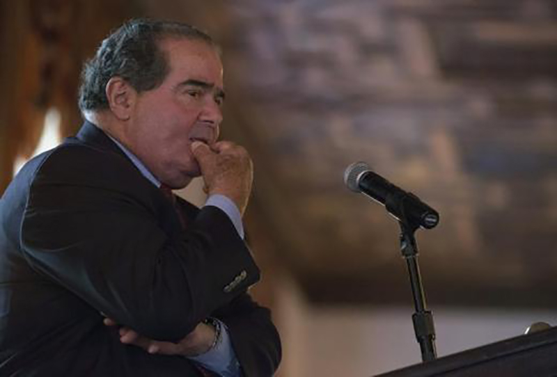 U.S. government having to be neutral about religion is not supported by the Constitution and is not rooted in American history, Supreme Court Justice Antonin Scalia said Saturday at a speech at a Catholic high school in Louisiana.
