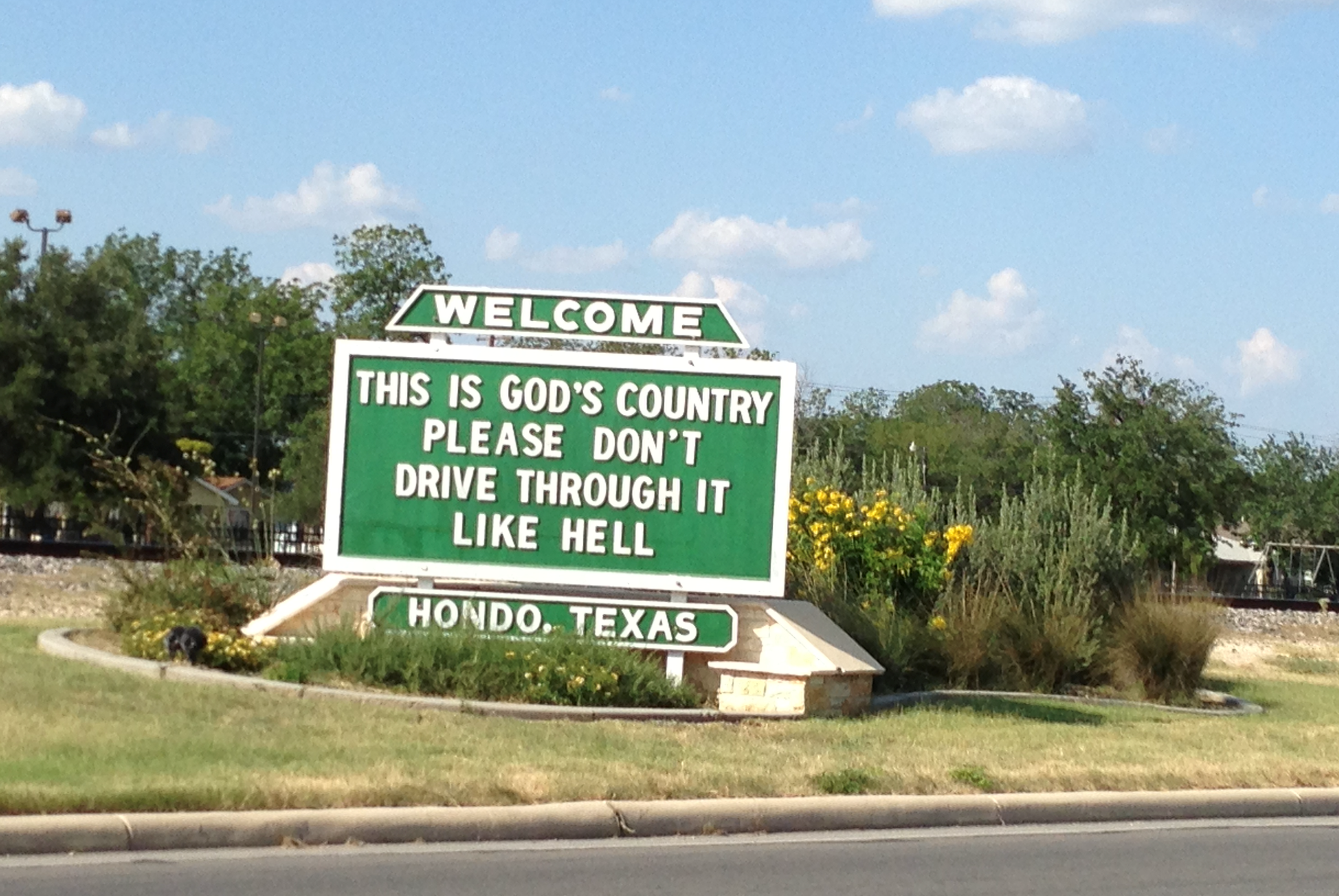 Since 1932, two memorable signs that proclaimed "This Is God's Country - Please Don't Drive Through It Like Hell" greeted people traveling through Hondo, Texas. When Freedom From Religion Foundation representatives asked city officials to remove the signs, Mayor Jim Danner said Monday, "There's no way in hell we're going to take those signs down."