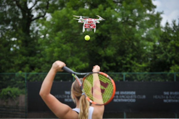 Drones have certainly found yet another niche for itself in this world -- by being a tennis trainer of sorts so that one can up one's game on the court. Hopefully the drone is agile enough to avoid any kind of wayward shots in its direction!