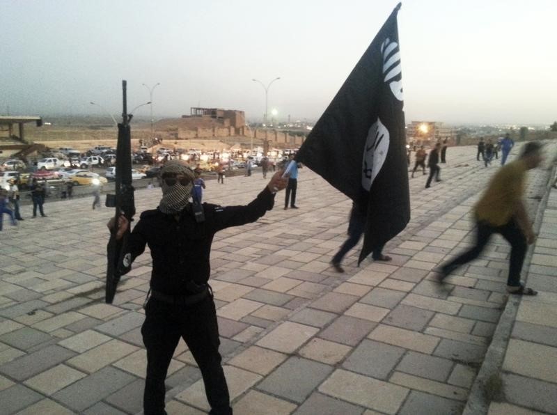 Islamic state militants executed a number of youths accused of joining an anti-ISIS faction by slicing them in half with chainsaws in the public square, a disturbing new report has revealed.