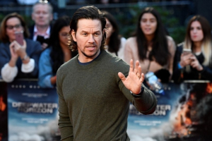 Actor Mark Wahlberg poses as he arrives at the European premiere of 