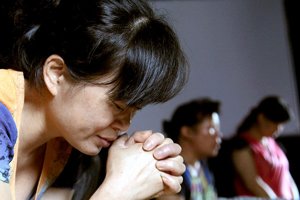 Chinese Christians must stand up for their faith as the communist government furthers efforts to rewrite the Bible, a persecution watchdog group has warned.