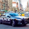 Ford to deliver a 38 mpg hybrid car for the police