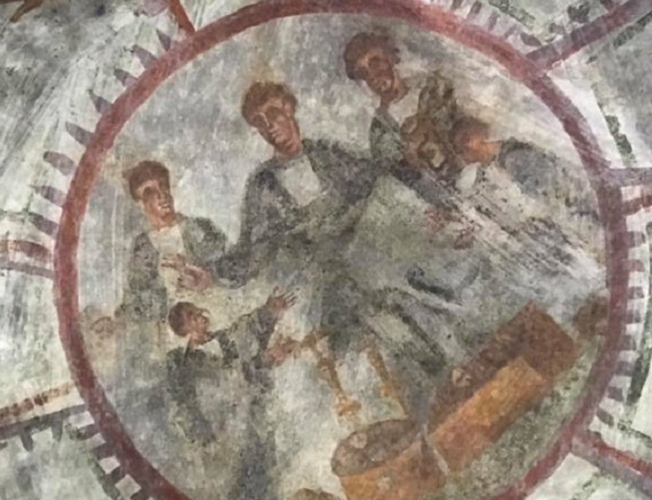 A fresco depicting Jesus with a man on either side, believed to be the apostles Peter and Paul or St. Nerius and St. Achilleus. (Quanta System SpA)