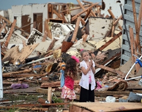 The massive tornado that devastated an area near Oklahoma City left entire neighborhoods flattened, homes, businesses and schools destroyed.