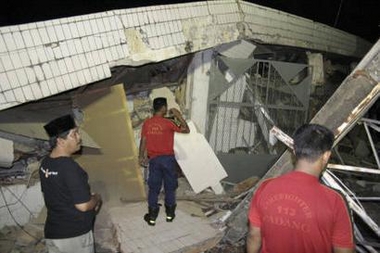 A powerful magnitude-8.2 quake struck the west coast of Indonesia Wednesday evening, triggering a small tsunami and sending hundreds of people in affected cities fleeing into the streets.