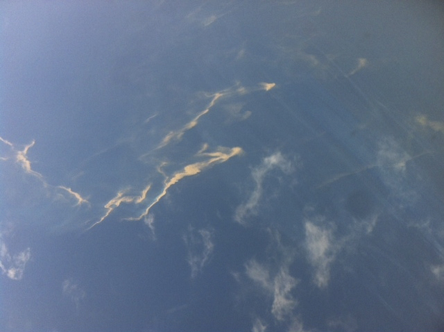 An oil slick spotted in the sea between Malaysia and Vietnam that had been linked to the missing Malaysia Airlines Flight MH 370 was determined not to be from an aircraft, investigator said Monday.