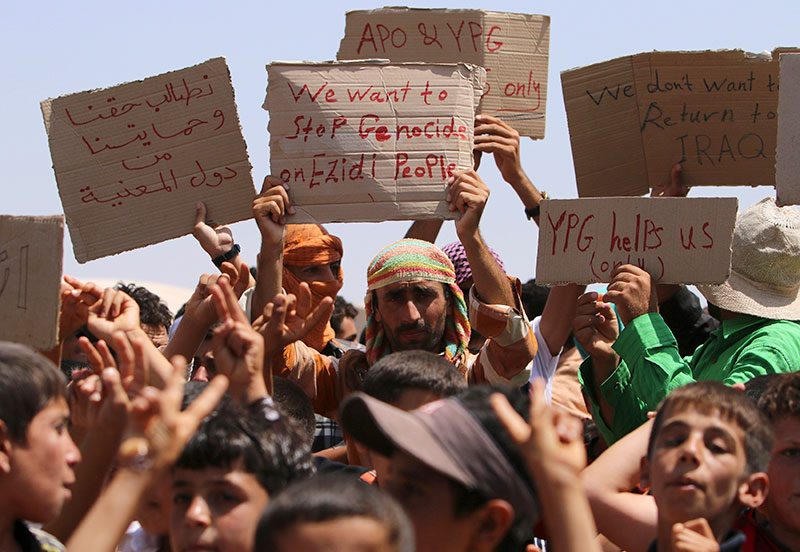 Yazidi and Christian Refugees Fleeing ISIS Assault