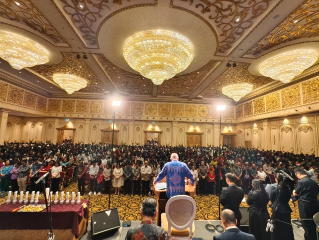Why did God become man? Rev. Don Tang, 85, passionately preaches the gospel message at the Asian Evangelistic Crusade in Singapore.