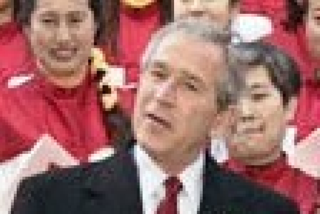 媒體報導布殊訪華期間 表達志願者被捕